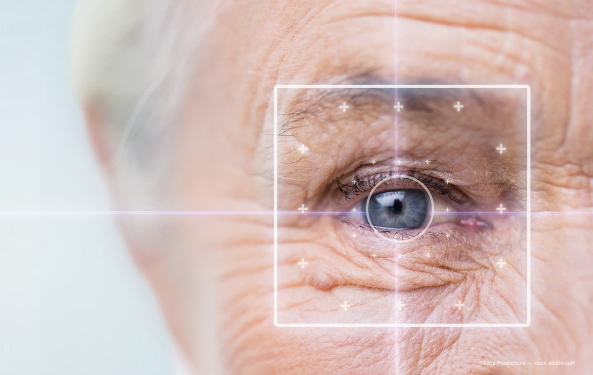 A close image of an older woman's eye with technology overlays on top of it