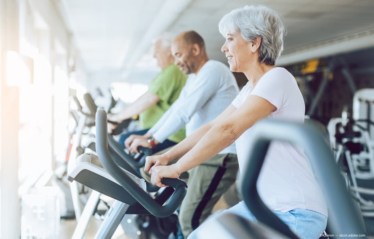 People on exercise bikes at a gym
