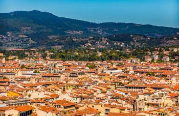 The historic centre of Florence, Italy, surrounded by rolling green hills. Image credit: ©H-AB Photography – stock.adobe.com