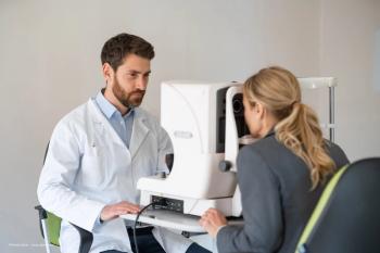 An ophthalmologist screens a young woman at a testing device. Image credit: ©Friends Stock – stock.adobe.com