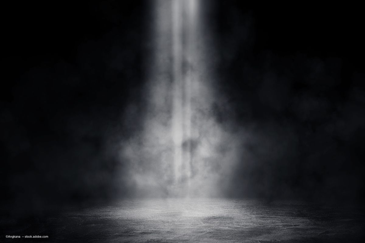 A spotlight shines down onto an empty stage. Image credit: ©Angkana  – stock.adobe.com
