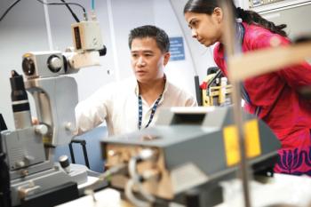 R. V. Paul Chan, MD, trains eye teams on board the Orbis Flying Eye Hospital in 2013.  (Image courtesy of Geoff Oliver Bugbee)  