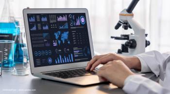 A computer displays data, charts and maps, in front of a laboratory setting including beakers and a microscope. Concept image for ophthalmology life sciences medical business agreement. Concept for Topcon Healthcare acquisition and funding with Toku Inc and Sanro Health. Image credit: ©InfiniteFlow – stock.adobe.com