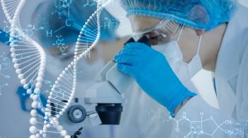Scientist studying genes under a microscope