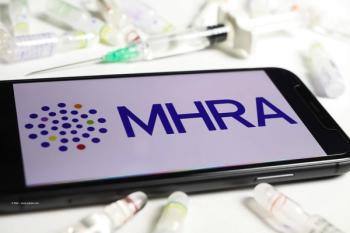 A phone shows the UK MHRA logo. Image credit: © Ralf – stock.adobe.com