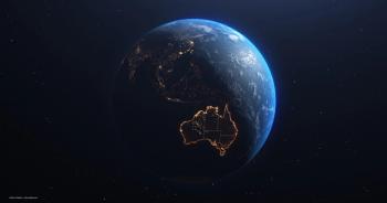The Earth, suspended in space. Australia is bordered by illuminated lights. Image credit: ©Sono Creative – stock.adobe.com