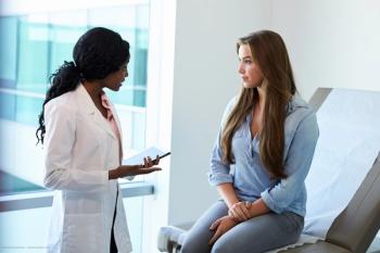 A young woman is assessed by her doctor. Concept image for tubulointerstitial nephritis and uveitis TINU case study. Image credit: ©Monkey Business – stock.adobe.com