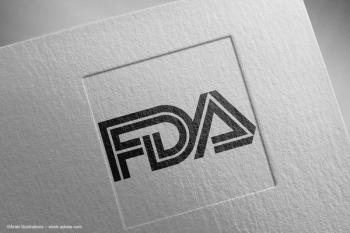 The FDA logo printed and embossed on cardstock. Concept image for FDA complete response letter, pharmaceutical ophthalmic CRL, eylea bayer and regeneron aflibercept. Image credit: ©Araki Illustrations – stock.adobe.com
