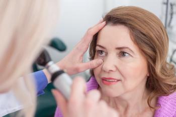 middle aged women having her eyes examined