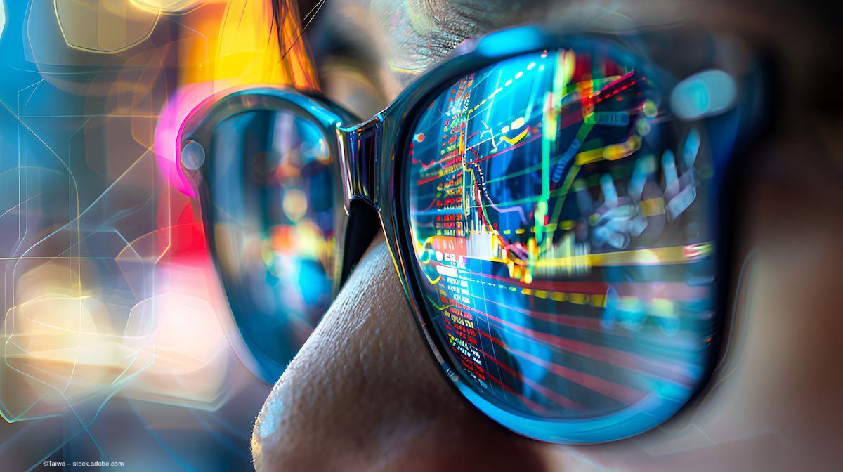 Glasses with an overlay of digital data outputs on the surface. Image credit: ©Taiwo – stock.adobe.com