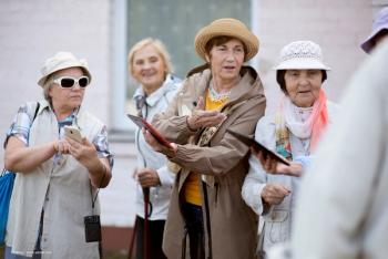 A group of elderly women navigate a street in Europe. Concept image for age-related macular degeneration and geographic atrophy. Image credit: ©Zelma – stock.adobe.com
