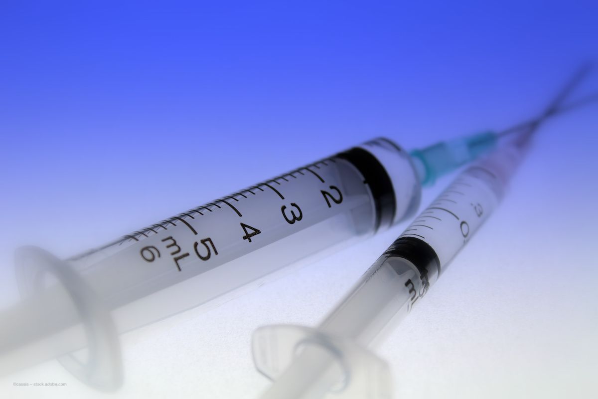 Two empty medical syringes on a gradient blue and white surface. Concept image for methotrexate for intravitreal injection for retinitis pigmentosa, European Medicines Agency (EMA) orphan drug designation announcement. Image credit: ©cassis – stock.adobe.com
