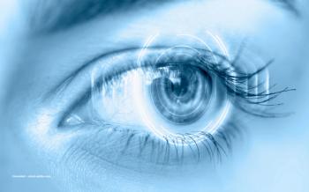 A close-up of an eye with a digital scanner overlay on the surface. Image credit: ©muratart – stock.adobe.com