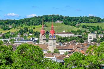 An image of the old town in Winterthur, Switzerland, showing buildings and clock towers. Image credit: ©bill_17 – stock.adobe.com