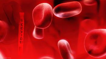 An illustration of enlarged blood cells and a vial labeled "COVID-19." Image credit: ©Mongkolchon – stock.adobe.com
