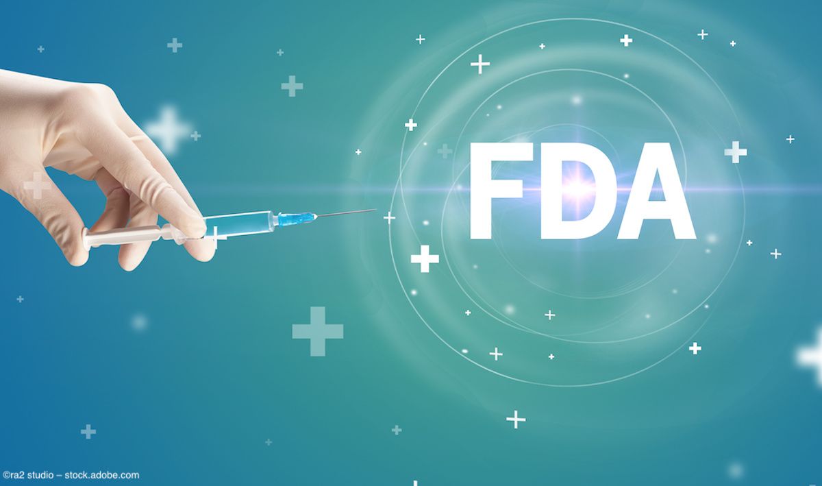 A gloved hand, holding a syringe, is pictured next to a US FDA (Food and Drug Administration) logo. Image credit: ©ra2 studio – stock.adobe.com