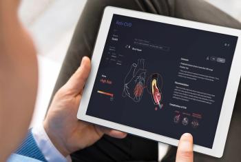 A person holds a tablet which displays results from the Dr.Noon CVD tool, which uses retinal scans to screen for cardiovascular disease. Image courtesy of Heart Eye.