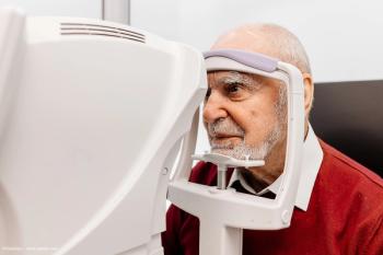 An elderly man undergoes an eye exam in a clinic. Image credit: ©Vladislav – stock.adobe.com