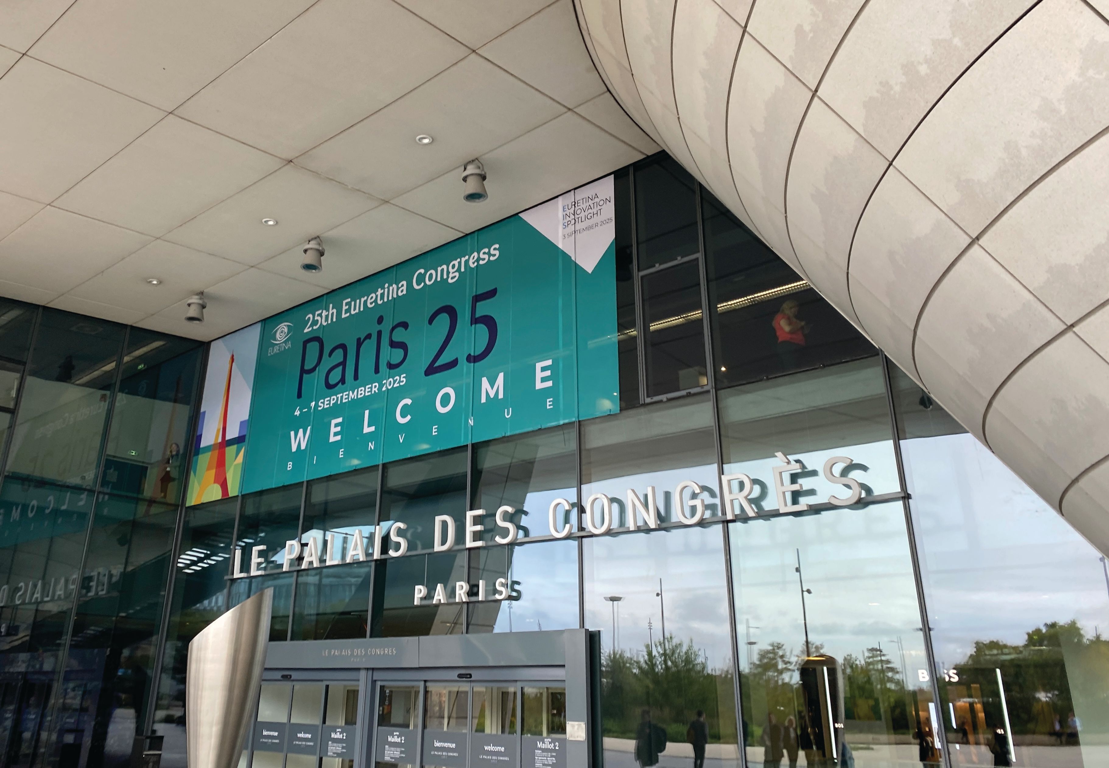 The exterior of Le Palais des Congrès in Paris, France, with signage for the 2025 EURETINA meeting. Image credit: Hattie Hayes