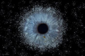 An illustration of an eye's iris and pupil, suspended on a dark background which evokes the depth of outer space. Image credit: ©Enis – stock.adobe.com