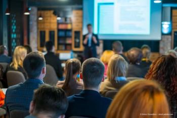 Audience listens lecturer at workshop. Concept image for ESCRS industry presentations by Ziemer Ophthalmic Systems, Heidelberg Engineering, STAR Surgical. (Image credit: ©Anton Gvozdikov/AdobeStock)