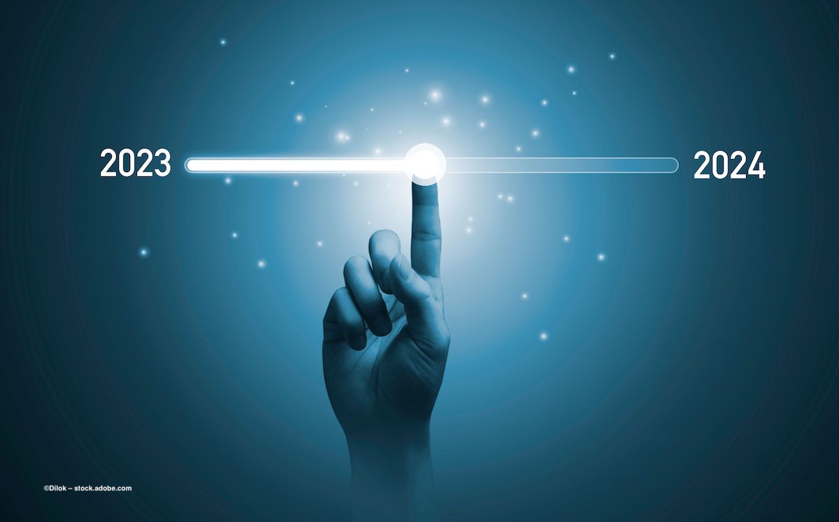 A person's hand moves a sliding counter from 2023 to 2024. Image credit: ©Dilok – stock.adobe.com