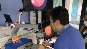 Figure. A surgeon trains using a vitreosurgical simulator.(Image courtesy of Marina Roizenblatt, MD, PhD)