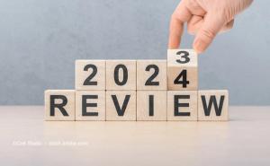 Wooden blocks read "2023 Review," as the year 2023 turns to 2024. Image credit: ©Celt Studio – stock.adobe.com