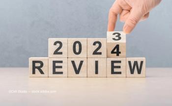 Wooden blocks read "2023 Review," as the year 2023 turns to 2024. Image credit: ©Celt Studio – stock.adobe.com