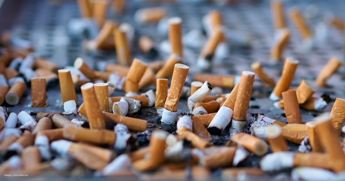 Dozens of cigarette butts, stubbed out on the dirty ground. Image credit: ©Gagula – stock.adobe.com