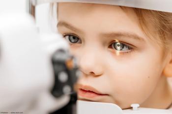 Child undergoing exam with slit lamp Image credit: AdobeStock/Vladislav