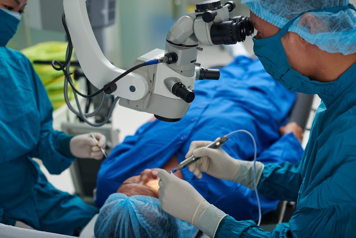 Surgeon performing ocular surgery Image credit: AdobeStock/DragonImages