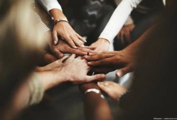 Hands in the middle of a huddle Image credit: AdobeStock/Rawpixel.com