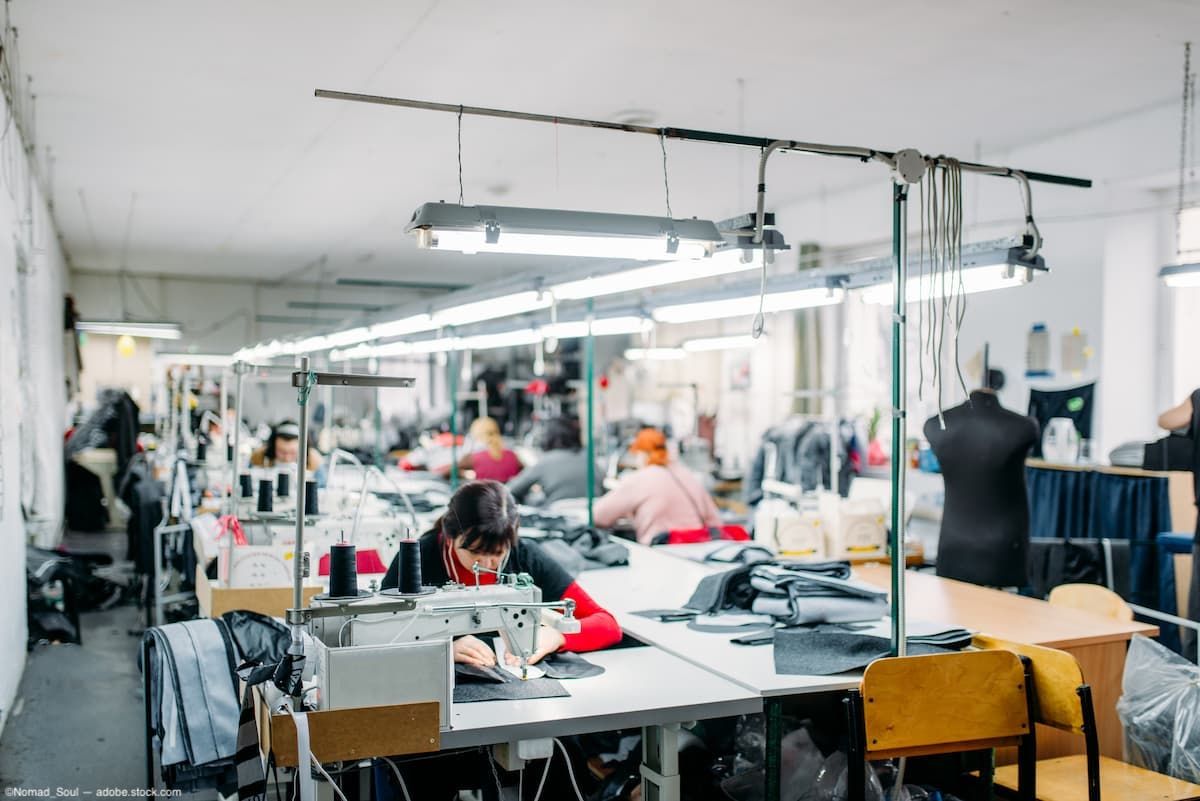 Garment factory workspace Image credit: AdobeStock/Nomad_Soul