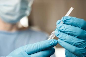 Physician holding injector with gloved hands Image credit: ©romas_ph - adobe.stock.com