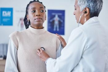 Woman receiving physical exam Image credit: AdobeStock/C.D./peopleimages.com