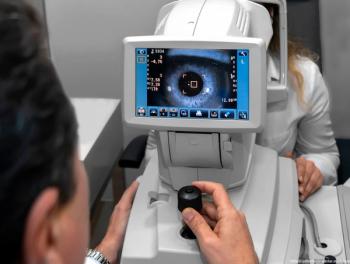 Physician conducting eye exam with fundus camera Image credit: AdobeStock/MedicalWorks