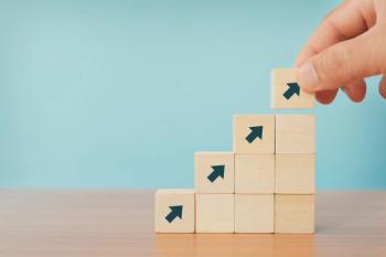 Building blocks with arrows Image credit: AdobeStock/jakkapan