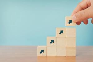 Building blocks with arrows Image credit: AdobeStock/jakkapan