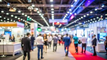 Blurry image of industry conference floor Image credit: AdobeStock/Robiul/AI