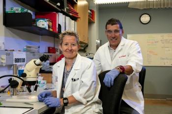 Lisa A. Brennan, PhD, research professor (left), and Marc Kantorow, PhD, associate dean of graduate programs and a professor of biomedical science, both of FAU Schmidt College of Medicine. Image credit: Florida Atlantic University Schmidt College of Medicine.