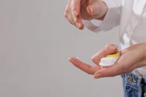 Contact lens on finger Image credit: AdobeStock/st.kolesnikov