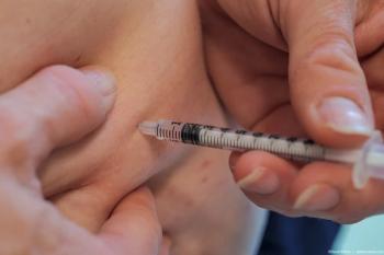 Person injecting GLP-1 into abdomen Image credit: AdobeStock/DavidElkins