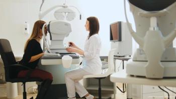 patient with optic neuritis has retina scanned by eye care provider - Image credit: Adobe Stock / KONSTANTIN SHISHKIN