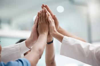 Doctors giving group high five Image credit: AdobeStock/WesleyJ/peopleimages.comDoctors giving group high five Image credit: AdobeStock/WesleyJ/peopleimages.com