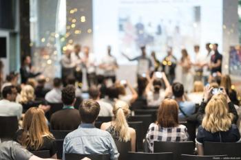 Celebration at conference Image credit: AdobeStock/kasto