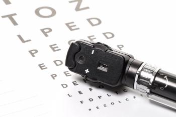 Ophthalmoscope on Snellen chart Image credit: AdobeStock/HenrikDolle