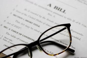 Legislative bill with eyeglasses Image credit: ©Tada Images - adobe.stock.com