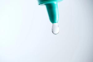 Eye drop coming from bottle Image credit: AdobeStock/taffpixture