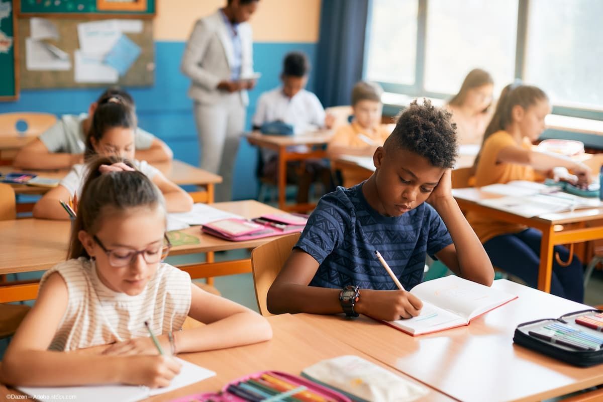 Children in classroom working on assingment